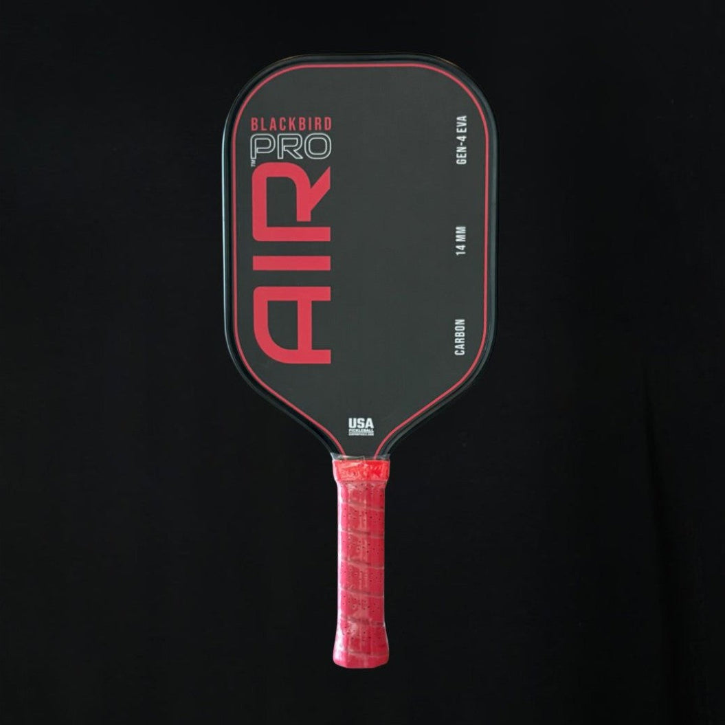 Pickleball paddle with 'Blackbird Pro' and 'AIR' branding on a black background
