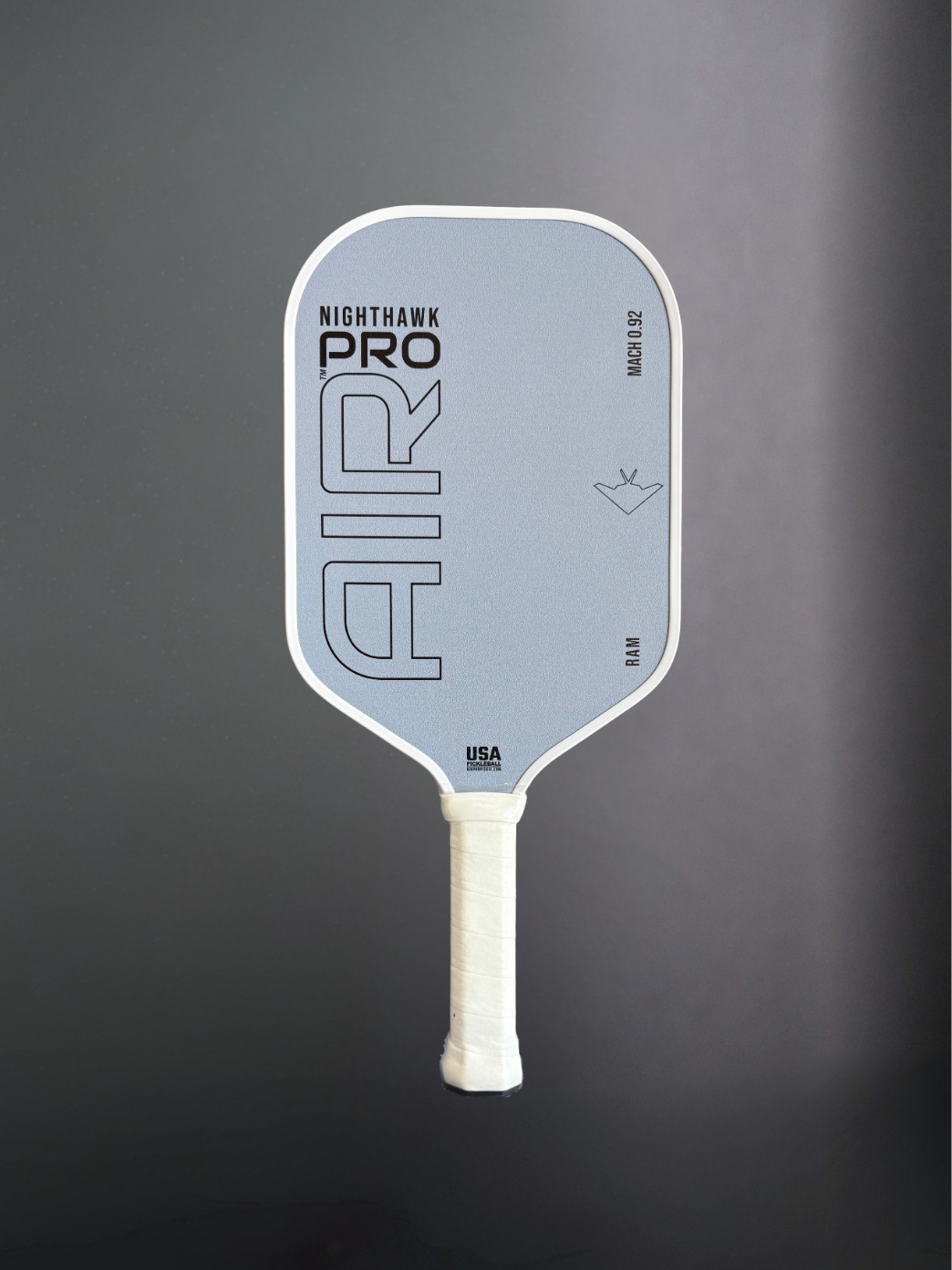 Pickleball paddle with 'Nighthawk Pro' branding on a gray background
