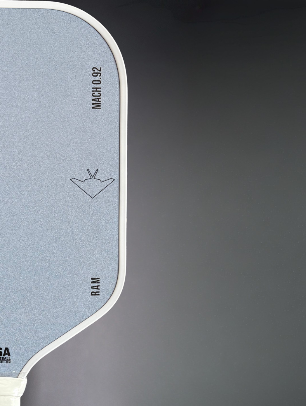 Close-up of a skateboard deck with branding and model information.