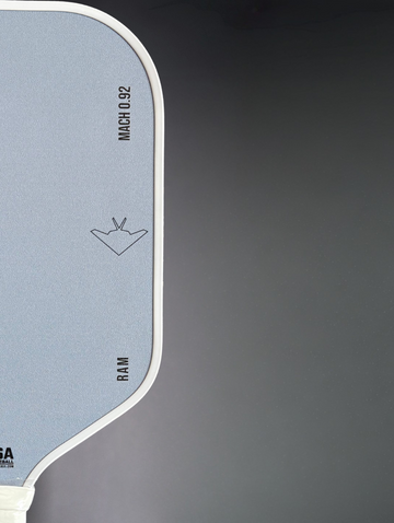 Close-up of a skateboard deck with branding and model information.
