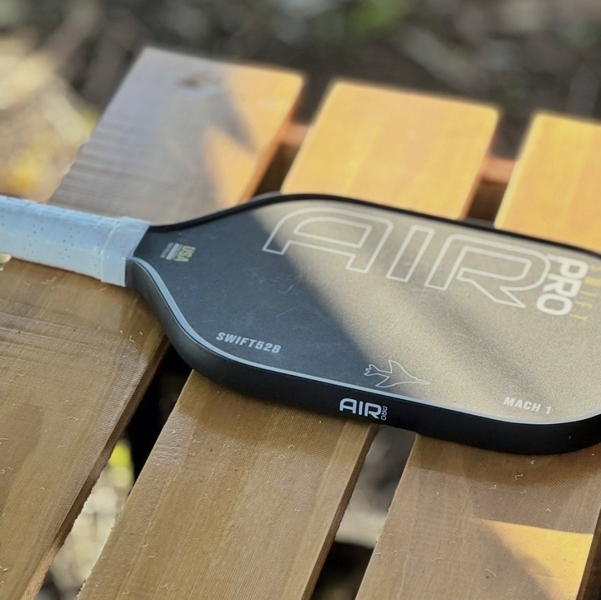 Swift Pro 16mm white grip on bench